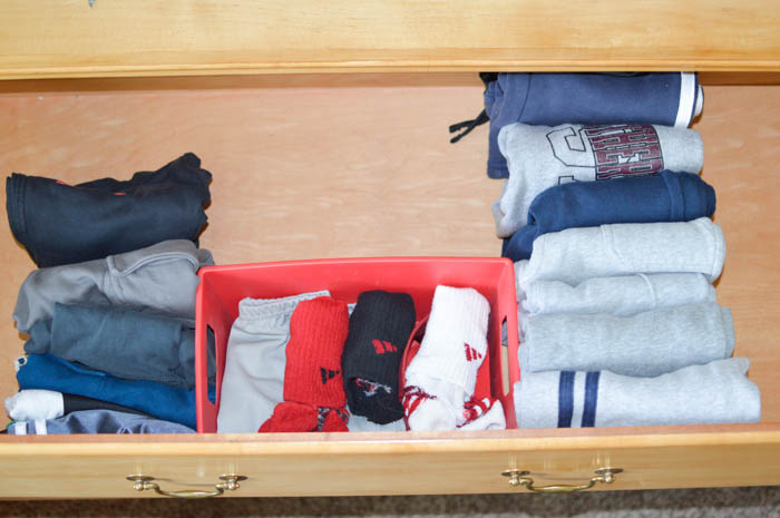Are you struggling to get your kid's out the door each morning? Simplify the process! Find out how to organize kid's clothes for easy mornings.